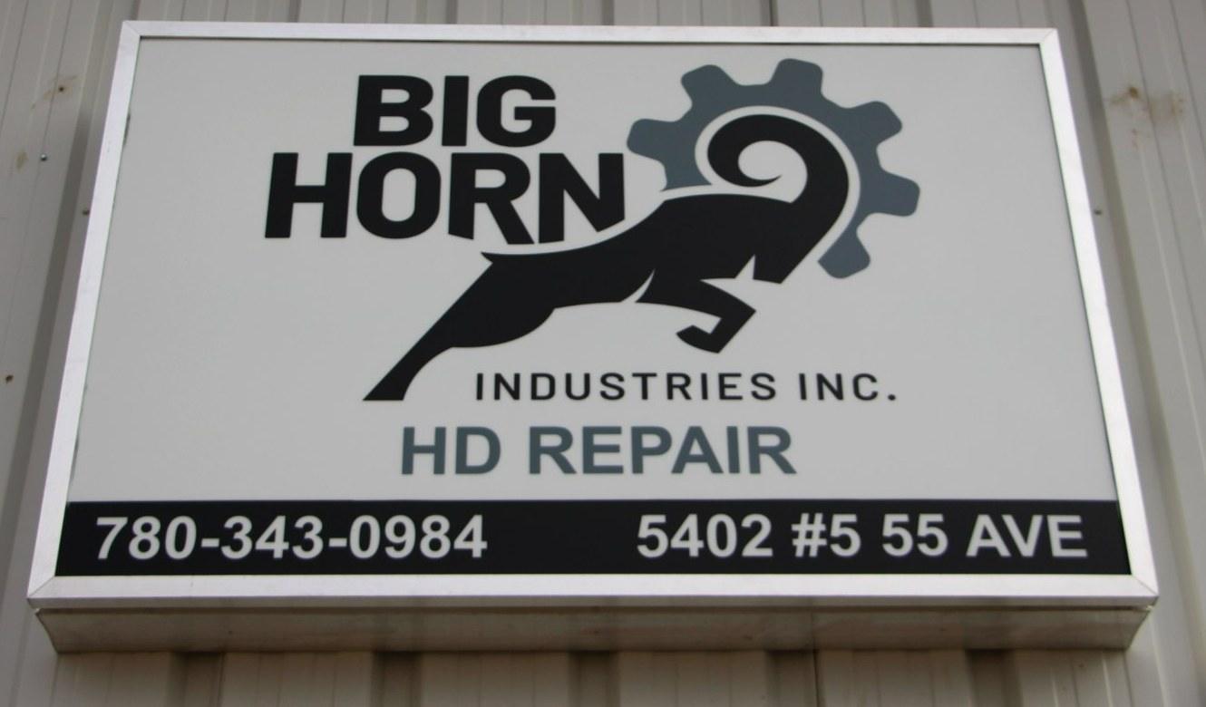 The Big Horn Industries HD Repair sign at the shop, showing the phone number 780-343-0984 and address 5402 #5 55 Ave.